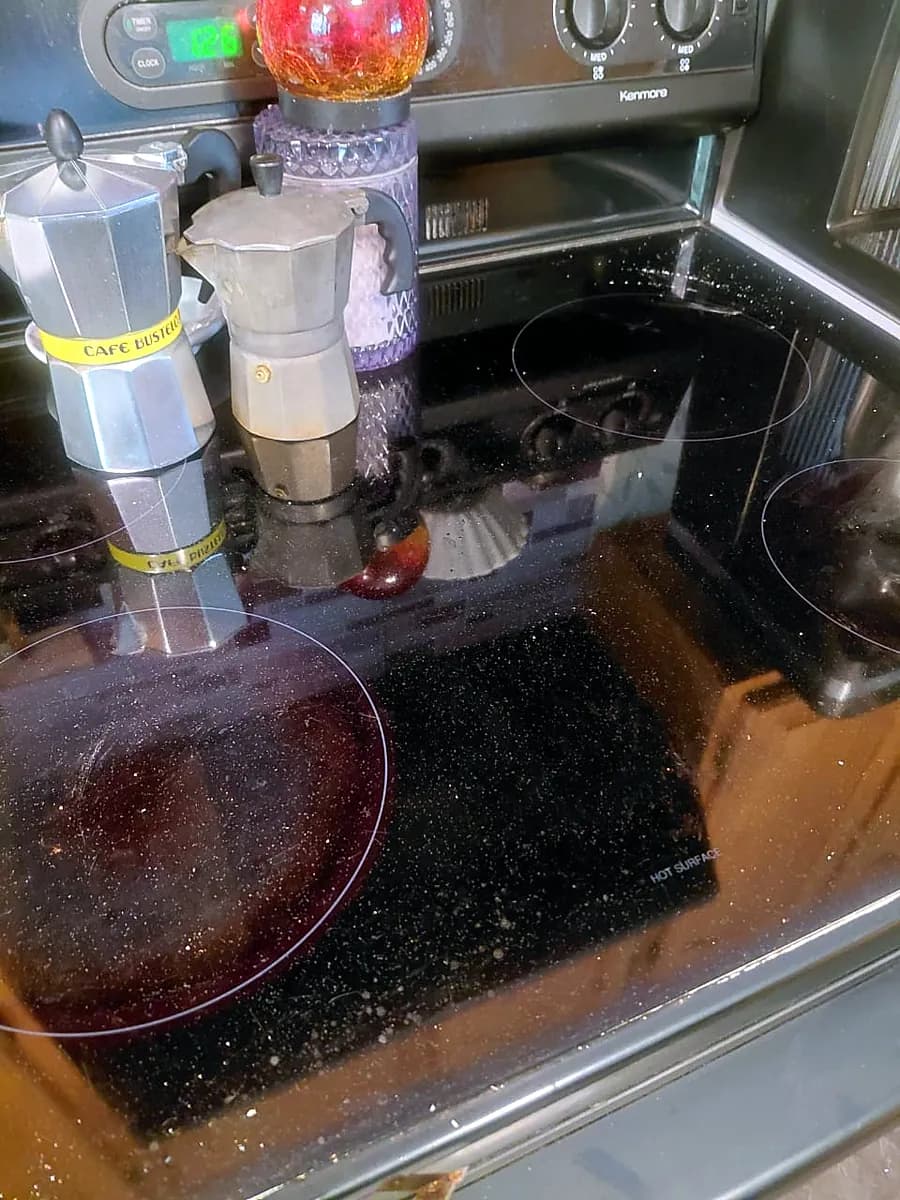Glass cooktop and stove before cleaning in Worcester, MA
