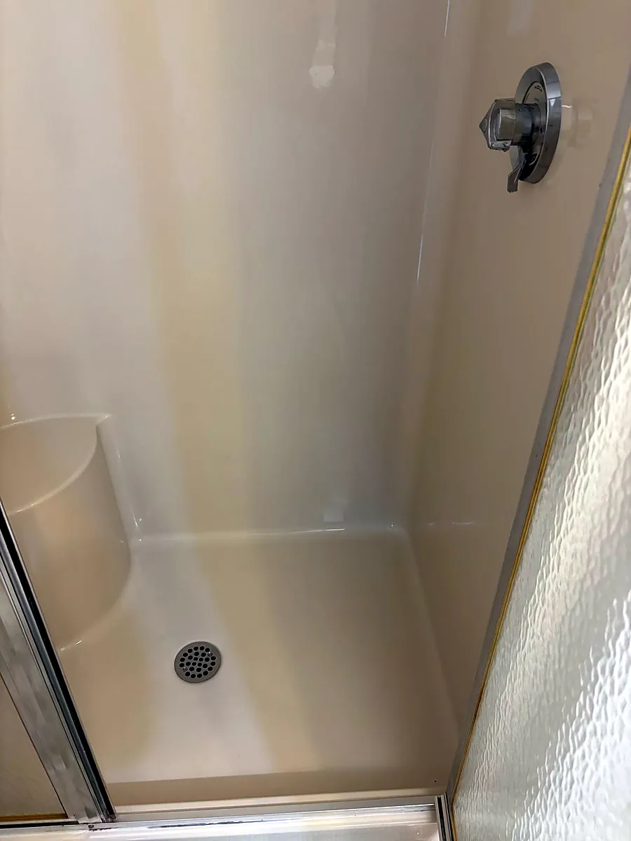 Sparkling shower stall after a Bella Shine deep cleaning in Worcester, MA